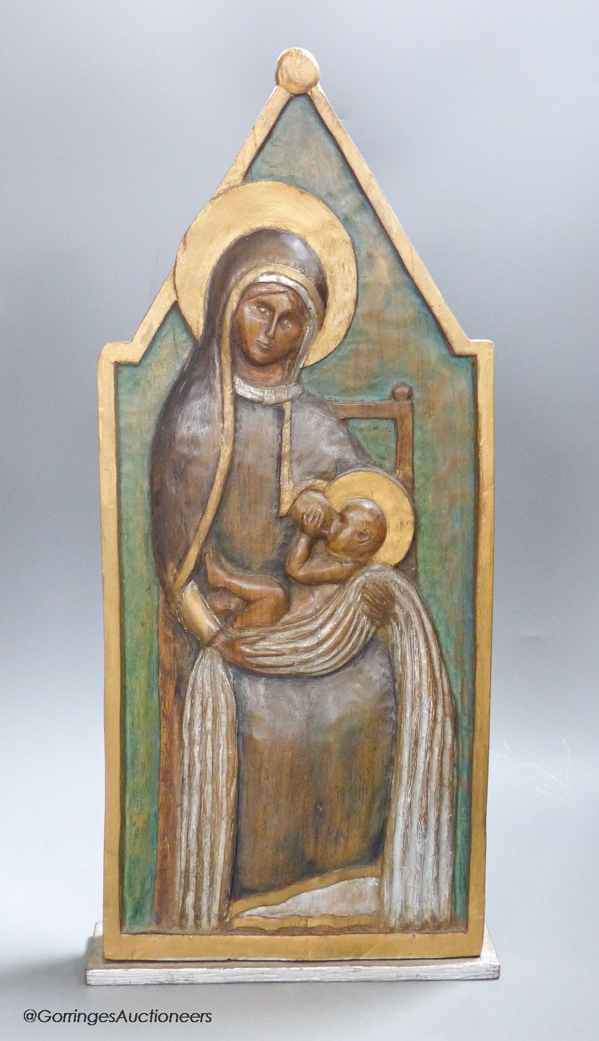 A late 20th century carving of the Madonna and Child, signed and dated to reverse John Collier 1991, length 51cm